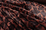 a close up of a leopard print fabric