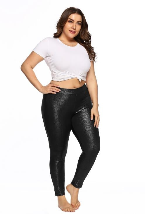 Plus Size Model in White Crop Top and Sparkly Black Leggings | Pretty Melanin Boutique