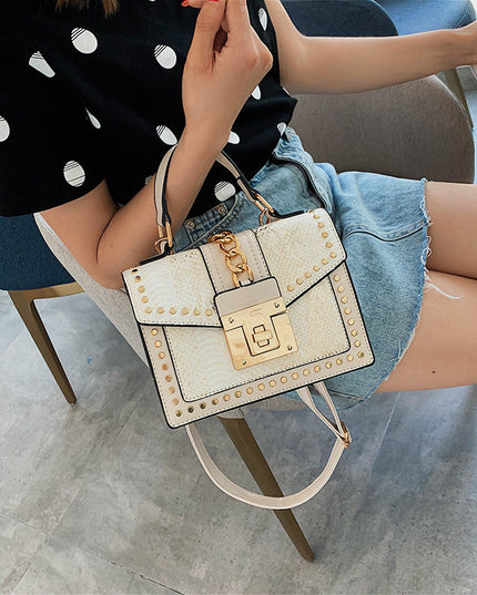 Fashion snake pattern handbag See size chart under “more details”