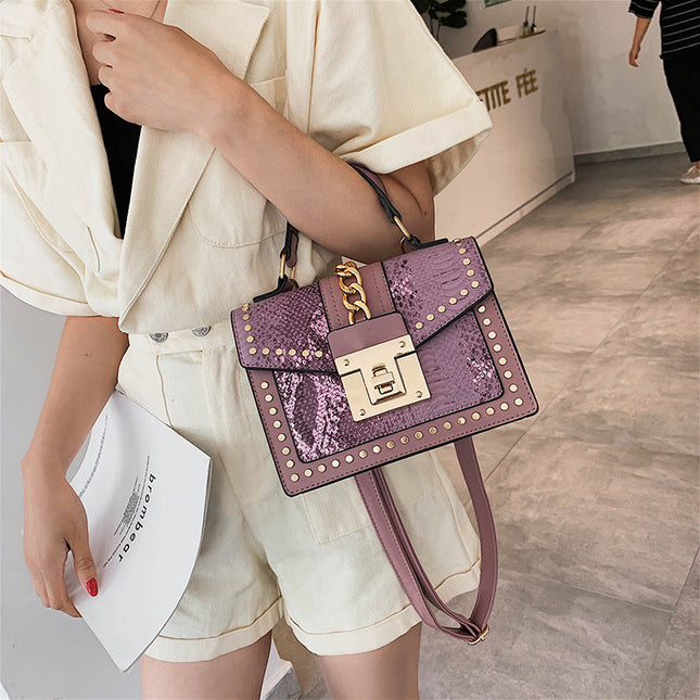 Fashion snake pattern handbag See size chart under “more details”
