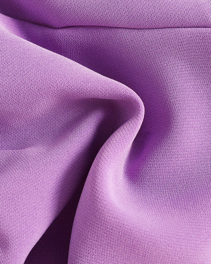 Vibrant purple textured fabric, ideal for children's bowknot crop top & ruffle shorts set from Pretty Melanin Boutique.