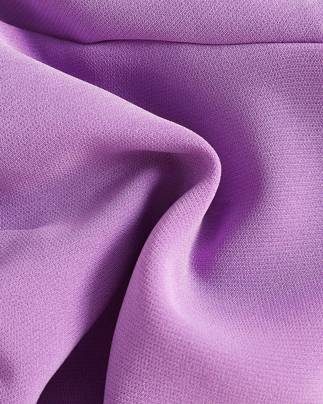 Vibrant purple textured fabric, ideal for children's bowknot crop top & ruffle shorts set from Pretty Melanin Boutique.