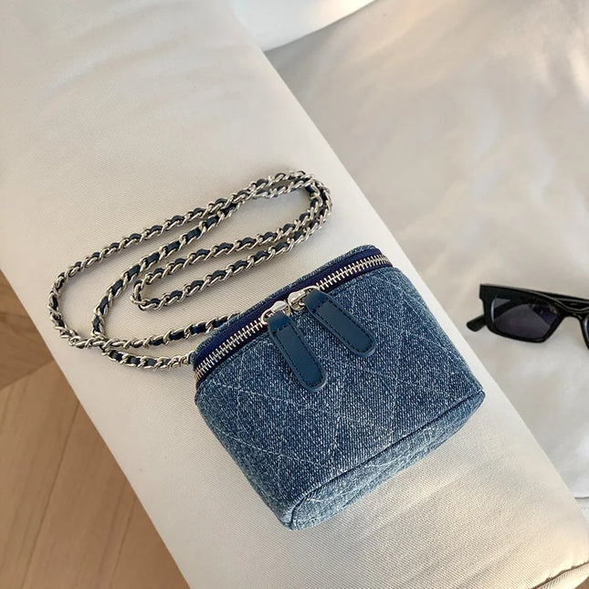 Mini denim crossbody bag for women with chain strap and quilted pattern. Fashion box purse.